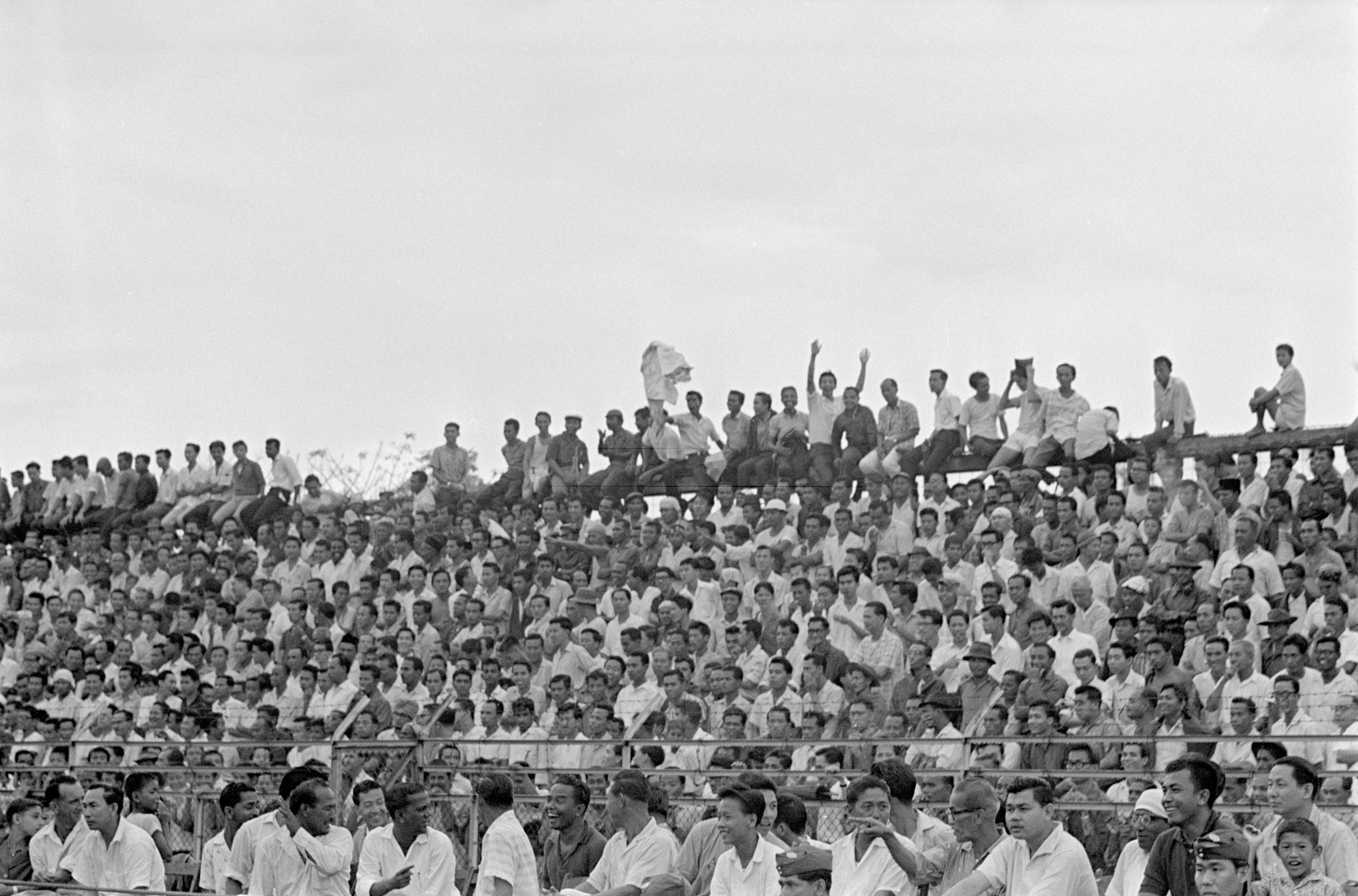 Spectators at the Malaya Cup final at Jalan Besar Stadium, 1963
